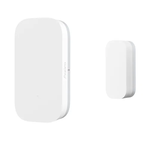 Na zdjęciu znajdują się dwa białe, prostokątne urządzenia marki Aqara, prawdopodobnie czujniki do systemu inteligentnego domu. Większe urządzenie jest po lewej stronie, a mniejsze po prawej, oba mają zaokrąglone krawędzie.