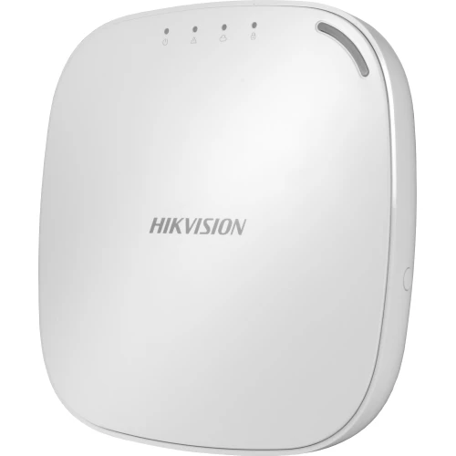 Na zdjęciu znajduje się biały, bezprzewodowy system alarmowy marki Hikvision o zaokrąglonych krawędziach. Na górze urządzenia widoczne są cztery diody sygnalizacyjne.