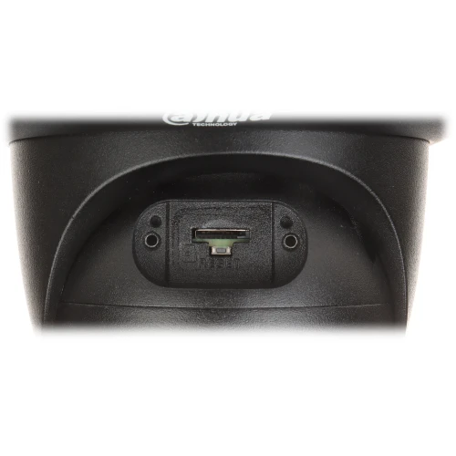 Zbliżenie na dolną część czarnej kamery IP Dahua, ukazujące porty i przycisk resetu. Widoczny jest również fragment logo producenta na górze.