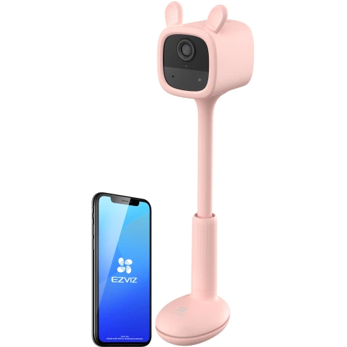 Różowa kamera niania z detekcją płaczu, wyposażona w elastyczny stojak i przypominająca kształtem misia. Obok kamery znajduje się smartfon z aplikacją EZVIZ na ekranie.
