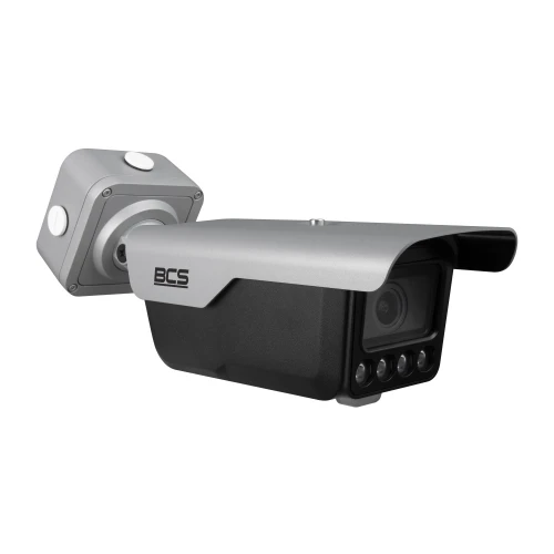 Kamera tubowa BCS w kolorze srebrno-czarnym z daszkiem ochronnym i czterema diodami LED na przodzie. Urządzenie posiada solidną obudowę i jest zamontowane na regulowanym uchwycie.