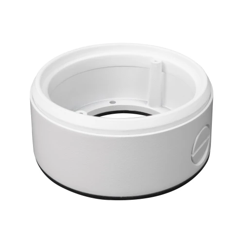 Na zdjęciu znajduje się biała, okrągła puszka montażowa do kamer, wykonana z tworzywa sztucznego. Puszka ma gładką powierzchnię i otwory montażowe na górze.