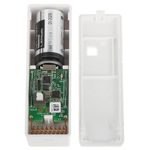 Zdjęcie przedstawia otwarte wnętrze elektronicznego urządzenia zasilanego baterią litową, z widoczną płytką drukowaną i elementami elektronicznymi. Obudowa urządzenia jest biała i wykonana z tworzywa sztucznego.