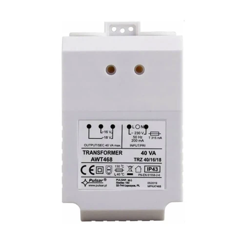 Prostokątny transformator AWT468 TRZ 40VA w białej obudowie z widocznymi oznaczeniami technicznymi i specyfikacją na przedniej stronie. Posiada dwa otwory montażowe na górze oraz oznaczenia dotyczące napięcia wejściowego i wyjściowego.