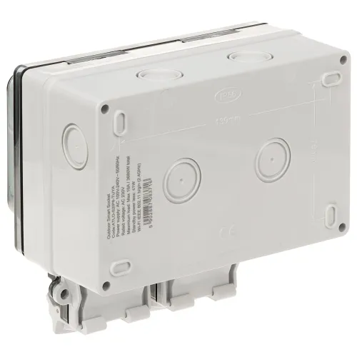 Zdjęcie przedstawia szarą, prostokątną obudowę elektryczną z oznaczeniem IP66, widzianą od strony mocowania. Na powierzchni obudowy znajdują się okrągłe wgłębienia i oznaczenia techniczne.