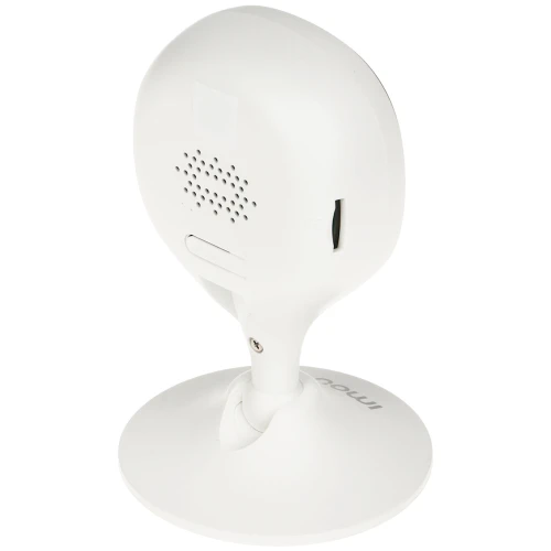 Biała kamera monitorująca o nowoczesnym designie, zamontowana na okrągłej podstawie. Widok z tyłu ukazuje otwory wentylacyjne i gniazdo na kartę pamięci.