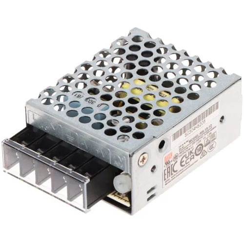 Zasilacz impulsowy Mean Well RS-15-12 z metalową obudową z otworami wentylacyjnymi. Widoczne są złącza i oznaczenia techniczne na boku urządzenia.