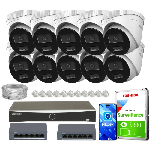 Na zdjęciu znajduje się zestaw do monitoringu, który obejmuje dziesięć kamer, rejestrator, dwa switche, dysk twardy oraz akcesoria montażowe. Kamery są ułożone w dwóch rzędach, a pozostałe elementy zestawu rozmieszczone są poniżej.