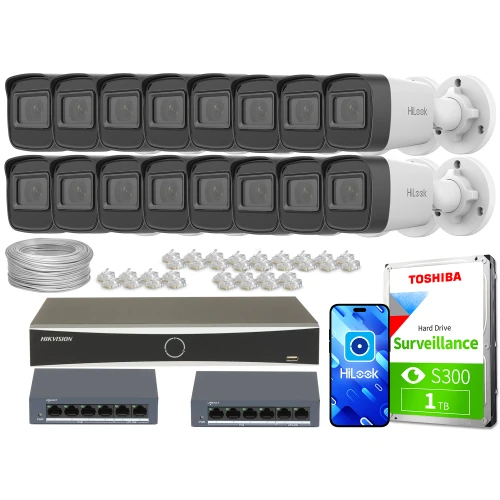 Zestaw do monitoringu składający się z szesnastu kamer HiLook, rejestratora Hikvision, dwóch switchów, dysku twardego Toshiba o pojemności 1 TB oraz akcesoriów montażowych. Na zdjęciu widoczne są również przewody i złącza potrzebne do instalacji systemu.
