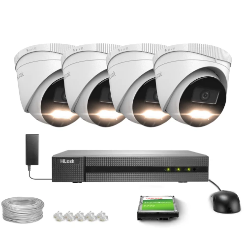 Zestaw do monitoringu składający się z czterech białych kamer kopułkowych, rejestratora, dysku twardego, myszy, kabla i złączek. Kamery i rejestrator są marki HiLook, a dysk twardy marki Toshiba.