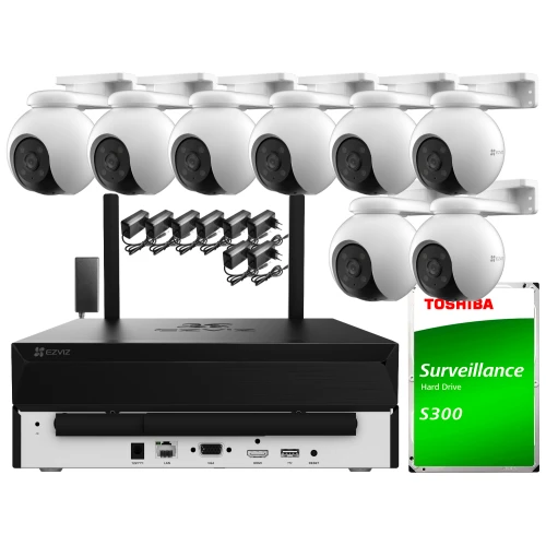 Zestaw do monitoringu składający się z ośmiu białych kamer Wi-Fi, rejestratora oraz dysku twardego Toshiba S300. Kamery są rozmieszczone w dwóch rzędach nad rejestratorem, a obok znajduje się dysk twardy.